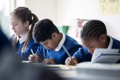 Students focused on their writing